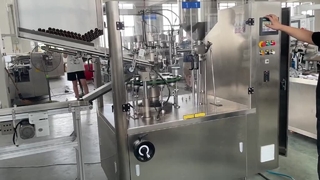 Máquina llenadora de tubos metálicos con estuchadora.