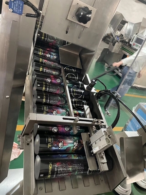 Máquina de llenado y sellado de tubos blandos con pantalla táctil con sistema automático de alimentación de tubos