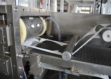 Máscara facial automática de la prueba del polvo que hace la empaquetadora de lacre del lado de la máquina tres